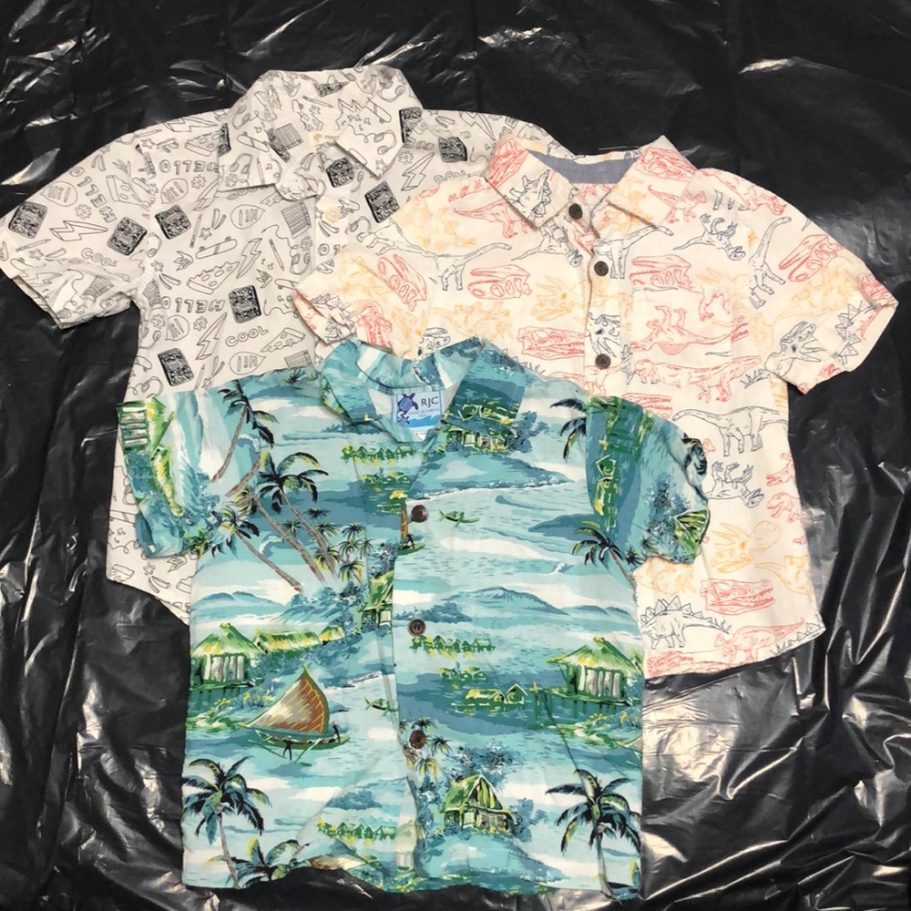 Three button up, collared, short sleeved shirts